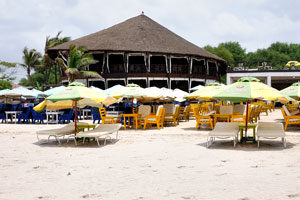 sun beds and parasols on Labadi beach Ghana